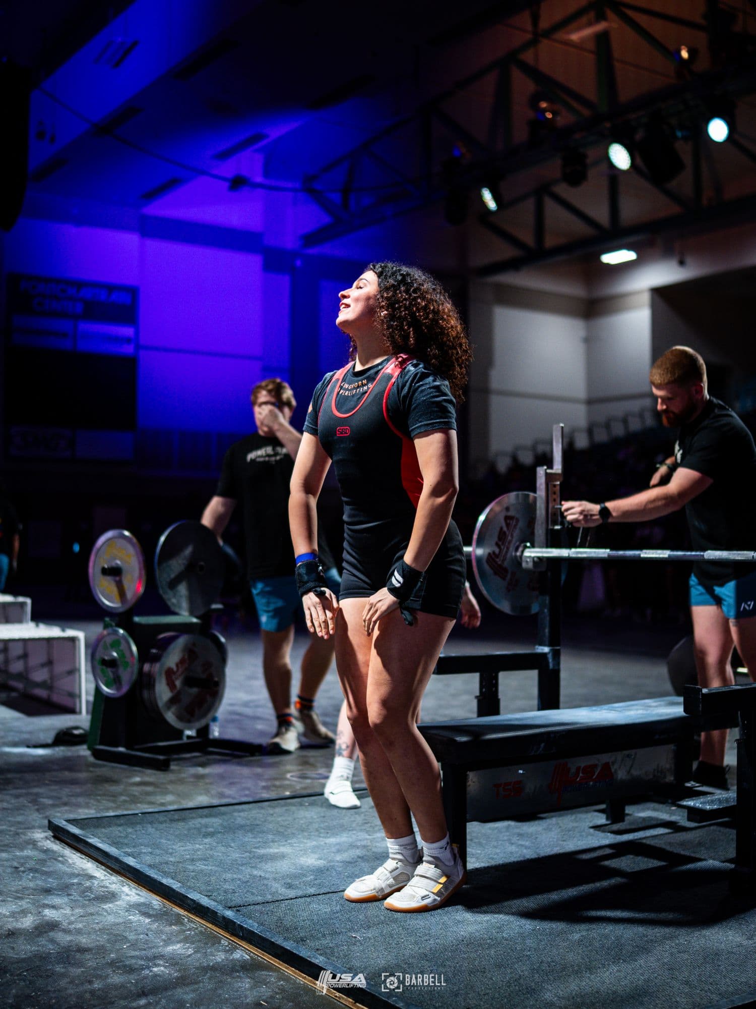 Sara Pishkar celebrating after a bench press attempt